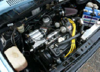HP Supercharger Kit on Suzuki Mighty Boy engine compartment Image copyright (c) 2011.